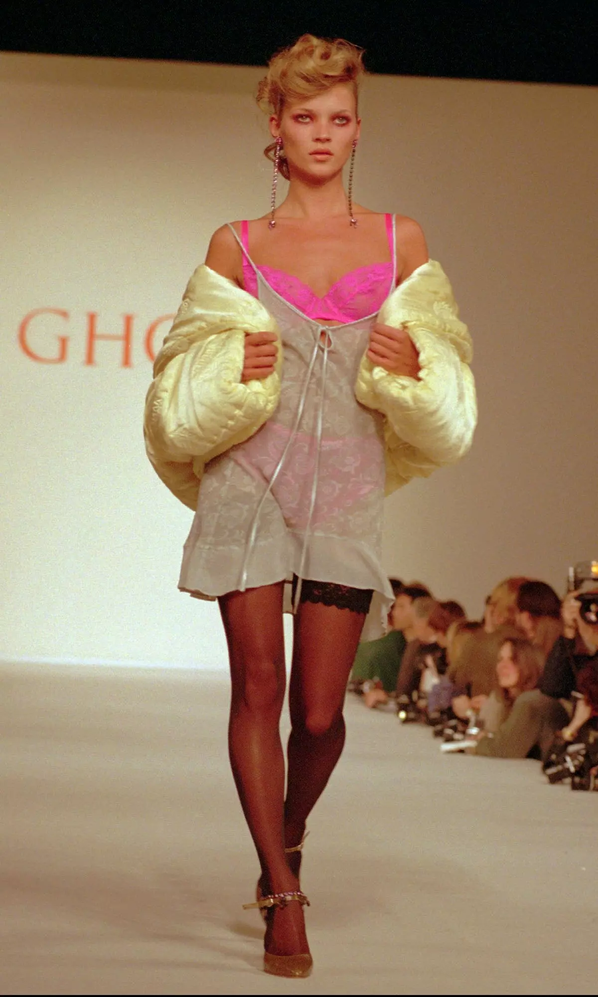 Model Kate Moss presents a chamomile leaf quilt jacket over a silver birch flock parchment slip from the Ghost Fall 1994 womenswear collection.