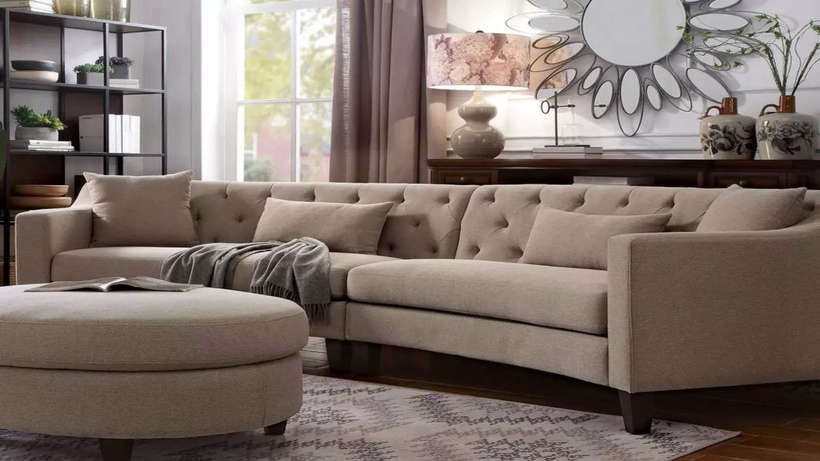 Curved sectional sofas like this one from Overstock are very in.