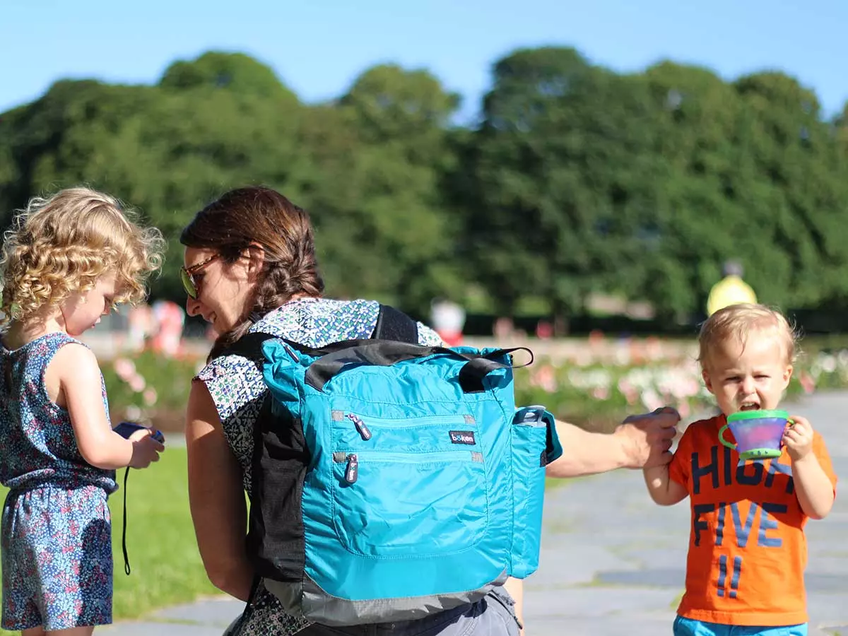 Using a backpack diaper bag allowed me free hands to keep toddler close!