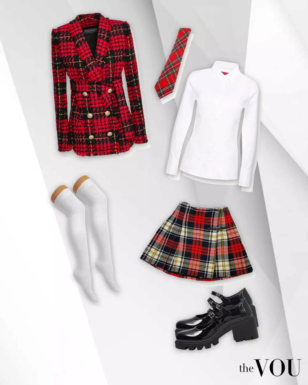 Edgy Preppy outfit: shoulder-padded plaid blazer, plaid skirt, shirt, plaid tie, knee-high socks
